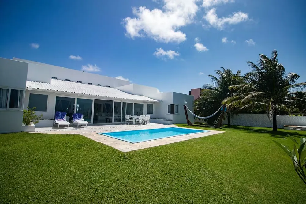 The villa seen across the pool